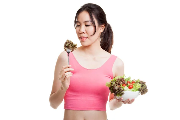 Mooie Aziatische gezond meisje geniet van eten Salade. — Stockfoto