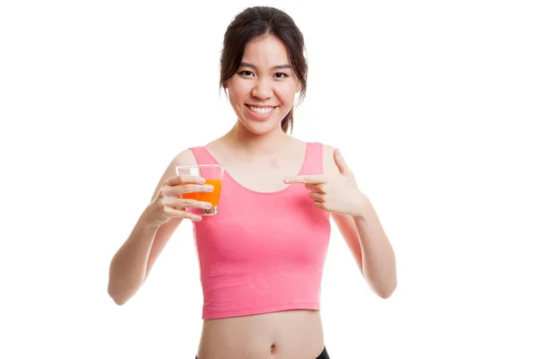 Schöne asiatische gesunde Mädchen zeigen auf Orangensaft. — Stockfoto