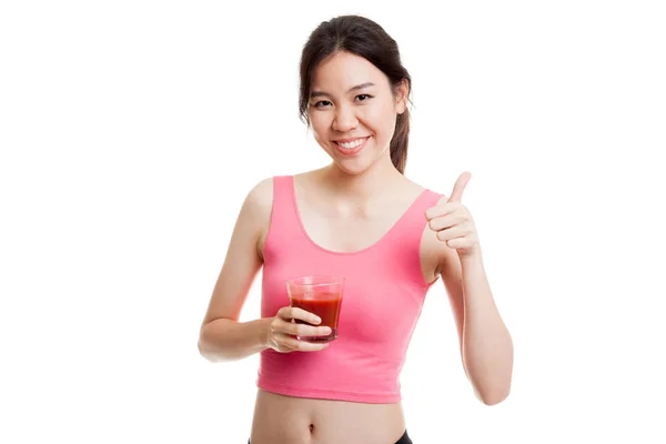 Schöne gesunde asiatische Mädchen Daumen nach oben mit Tomatensaft. — Stockfoto