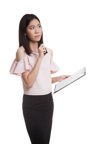 Young Asian business woman thinking with pen and clipboard. — Stock Photo, Image