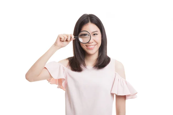 Young Asian business woman with a magnifying glass. — Stock Photo, Image