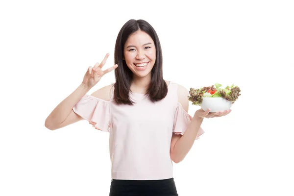 Здоровий азіатських ділової жінки Показати знак перемоги з салатом. — стокове фото