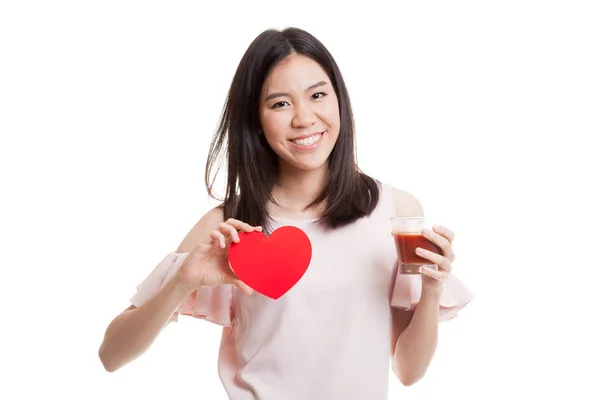 Young Asian business woman with tomato juice and red heart. — Stock Photo, Image