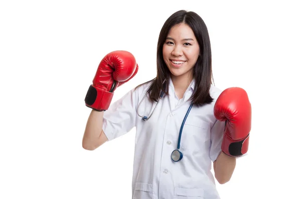 Young Asian female doctor guard with boxing glove. — Stock Photo, Image
