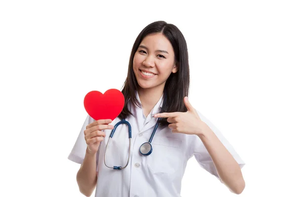 Young Asian female doctor point to red heart. — Stock Photo, Image