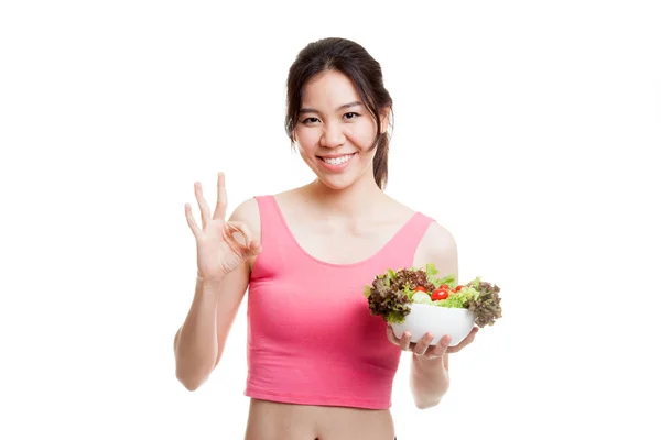 Beautiful Asian healthy girl show OK with salad. — Stock Photo, Image
