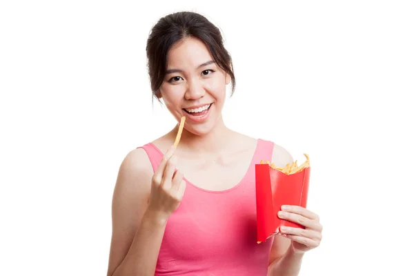 Schöne asiatische gesunde Mädchen essen Pommes frites. — Stockfoto