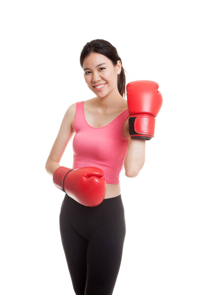 Beautiful healthy Asian girl with red boxing glove.