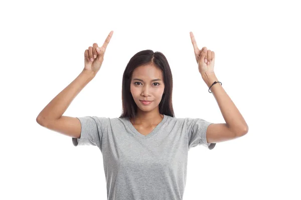 Jovem mulher asiática apontar para espaço em branco . — Fotografia de Stock