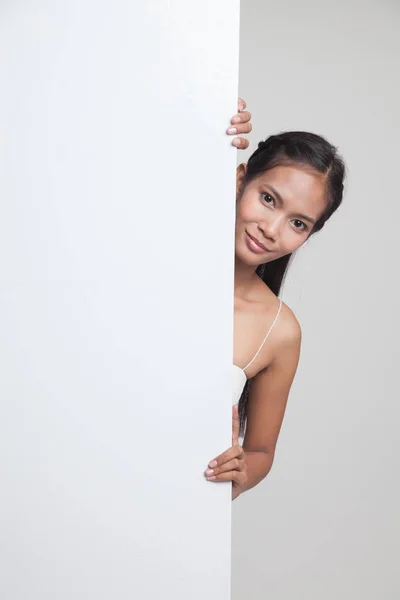 Young Asian woman with blank sign. — Stock Photo, Image