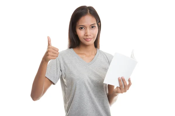 Jovem mulher asiática polegares para cima com um livro . — Fotografia de Stock