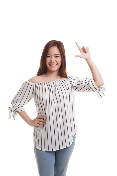 Young Asian woman smile and point up. — Stock Photo, Image