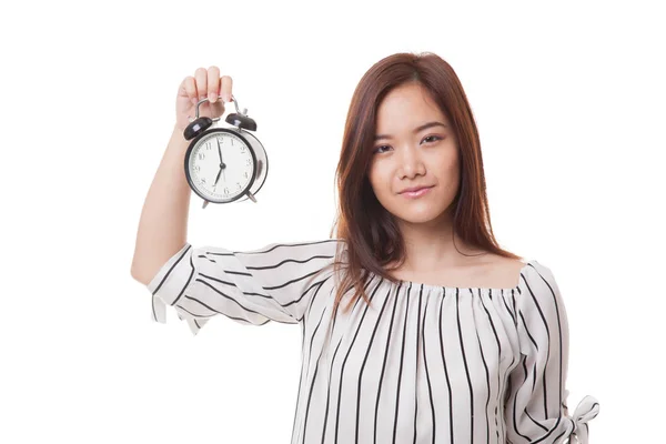 Young Asian woman with a clock. — Stock Photo, Image