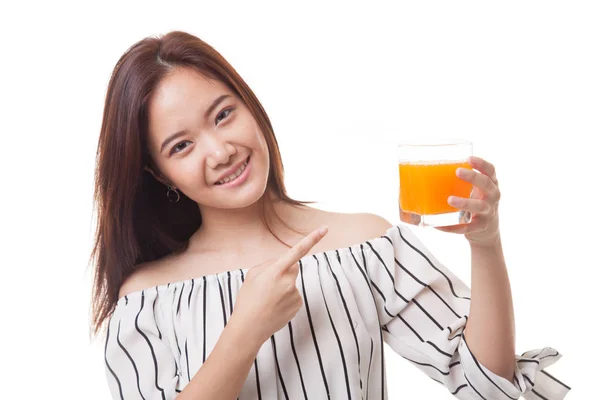 Joven asiática mujer punto a naranja jugo . — Foto de Stock