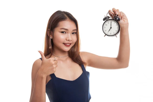 Joven asiática mostrar pulgares arriba con un reloj . —  Fotos de Stock