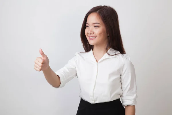 Aziatische vrouw duimschroef opwaarts en glimlach. — Stockfoto