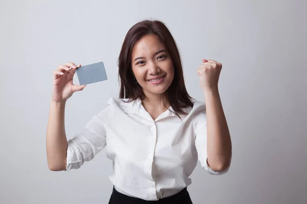 Young Asian woman fist pump with blank card. — Stock Photo, Image