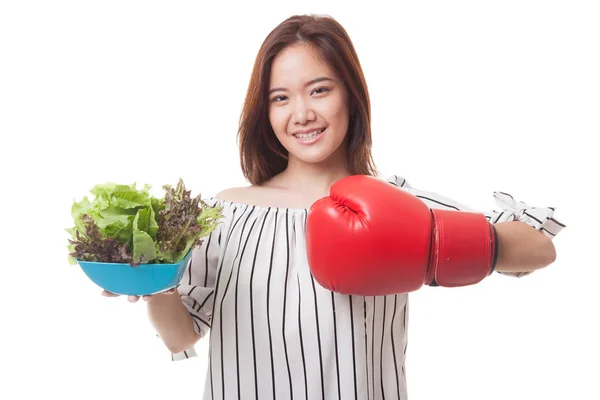 Young Asian woman with boxing glove and salad. — Stock Photo, Image