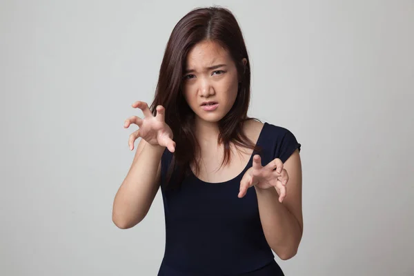 Young Asian woman with spooky hands gesture. — Stock Photo, Image