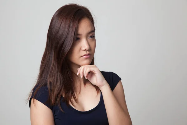 Serious  young Asian woman  look away. — Stock Photo, Image