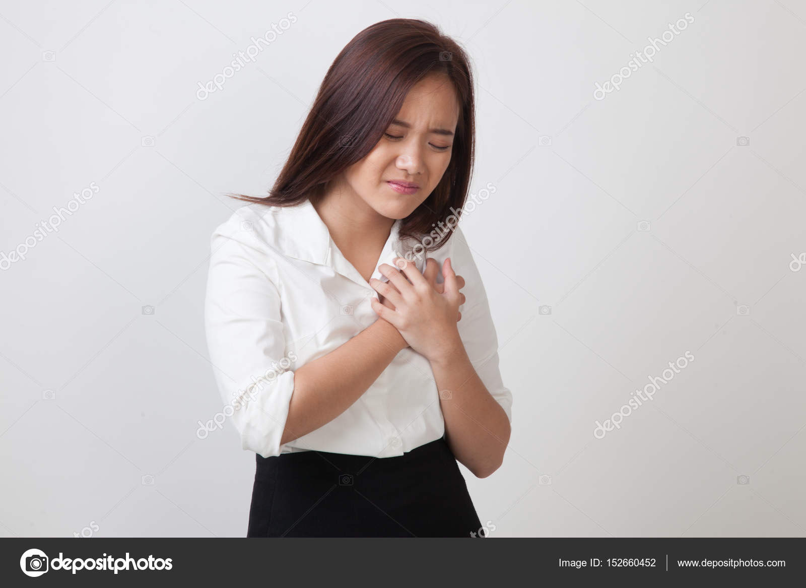 Young Asian woman got chest pain. — Stock Photo © Halfbottle 152660452