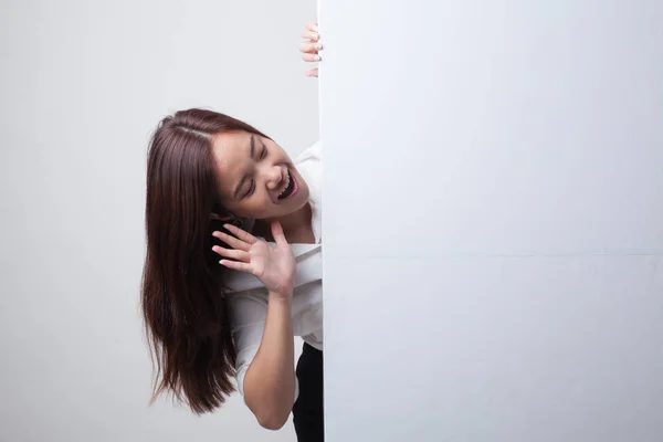Excited young Asian woman with blank sign. — Stock Photo, Image