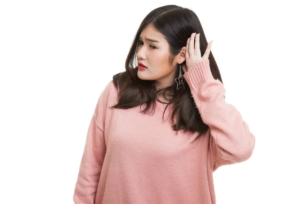 Krásná mladá asijská žena poslouchat něco. — Stock fotografie