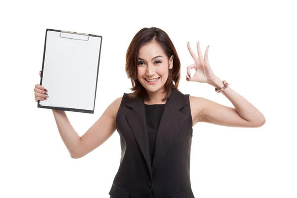 Young Asian business woman show OK and blank clipboard. — Stock Photo, Image