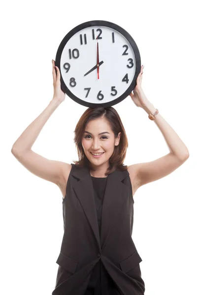 Jong aziatisch zakenvrouw met een klok. — Stockfoto