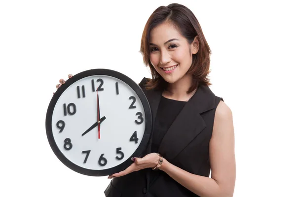 Junge asiatische Frau mit einer Uhr. — Stockfoto