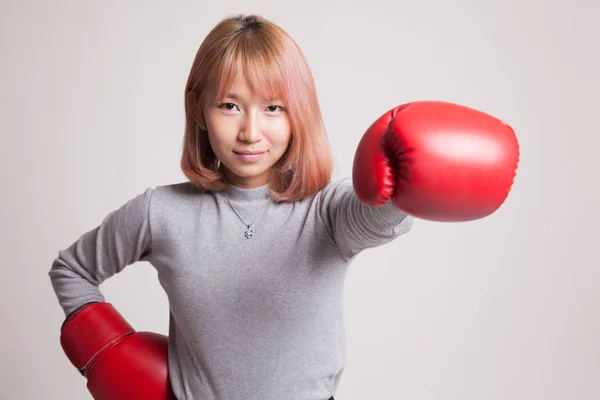 Young Asian woman with red boxing gloves. — Stock Photo, Image