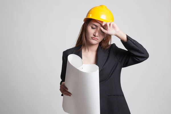 Tried Asian engineer woman with blueprints. — Stock Photo, Image