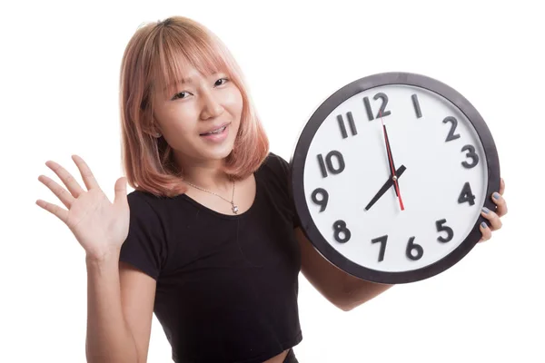 Feliz joven asiática mujer con un reloj . —  Fotos de Stock