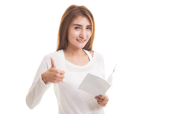Young Asian woman thumbs up with a book. — Stock Photo, Image