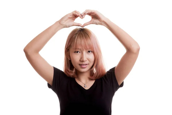 Young Asian woman gesturing  heart hand sign. — Stock Photo, Image