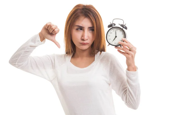 Joven mujer asiática pulgares abajo con un reloj . —  Fotos de Stock