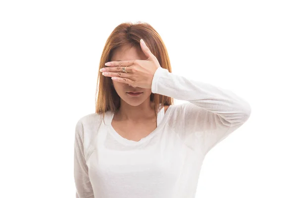 Young Asian woman close her eyes with hand. — Stock Photo, Image