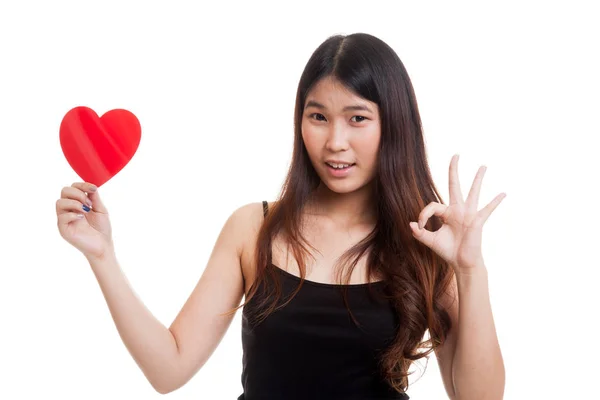 Asian woman show OK with red heart. — Stock Photo, Image