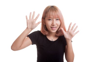 Genç Asyalı kadın dilini yapışkanlık dışarı.