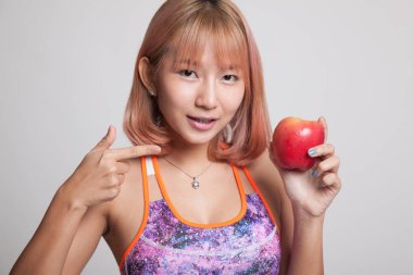 Güzel Asyalı sağlıklı kız nokta Apple.