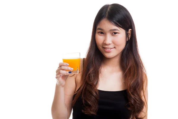 Joven mujer asiática beber jugo de naranja . — Foto de Stock