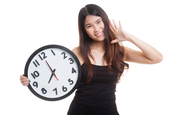 Happy Young Asian woman with a clock. — Stock Photo, Image