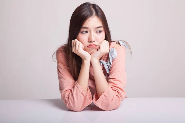 Asian girl with sad emotion.