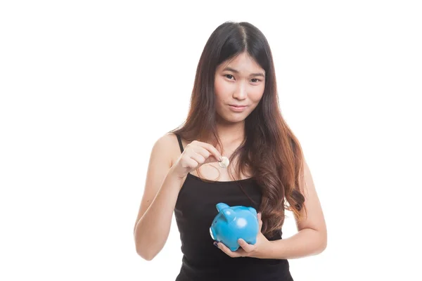 Asian woman with coin and pig coin bank. — Stock Photo, Image