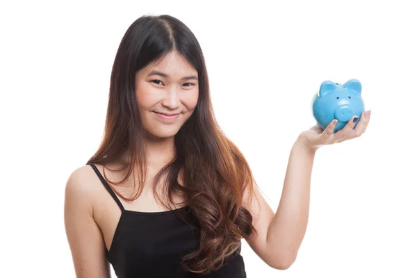 Young Asian woman with a pig coin bank. — Stock Photo, Image