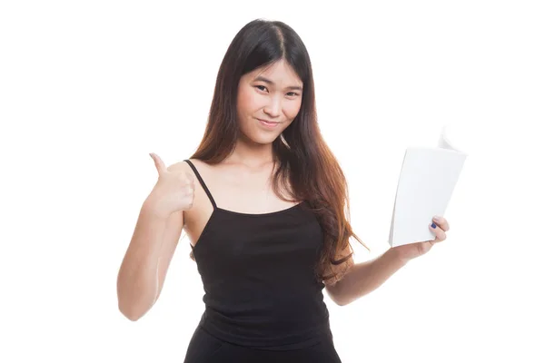 Ung asiatisk kvinna tummen upp med en bok. — Stockfoto