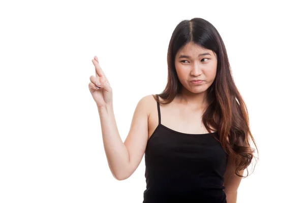 Schöne junge asiatische Frau Kreuzfinger. — Stockfoto