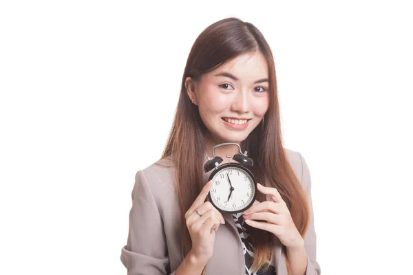 Fiatal ázsiai nő mosolyog egy óra. — Stock Fotó