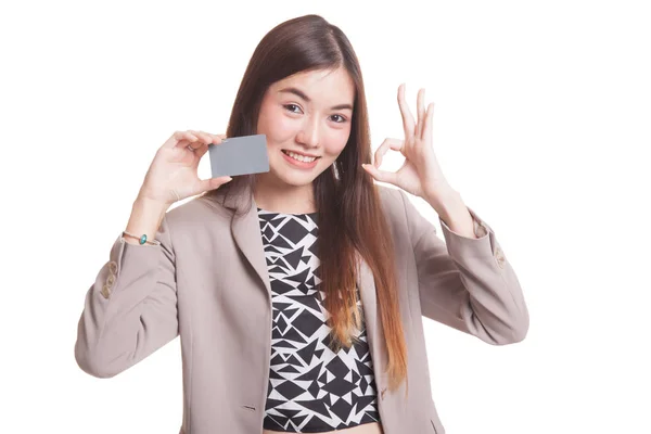 Young Asian woman show OK with a blank card. — Stock Photo, Image