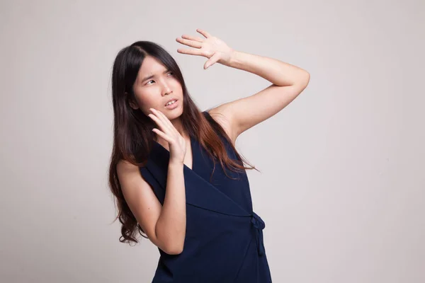 Excited young Asian woman look up. — Stock Photo, Image